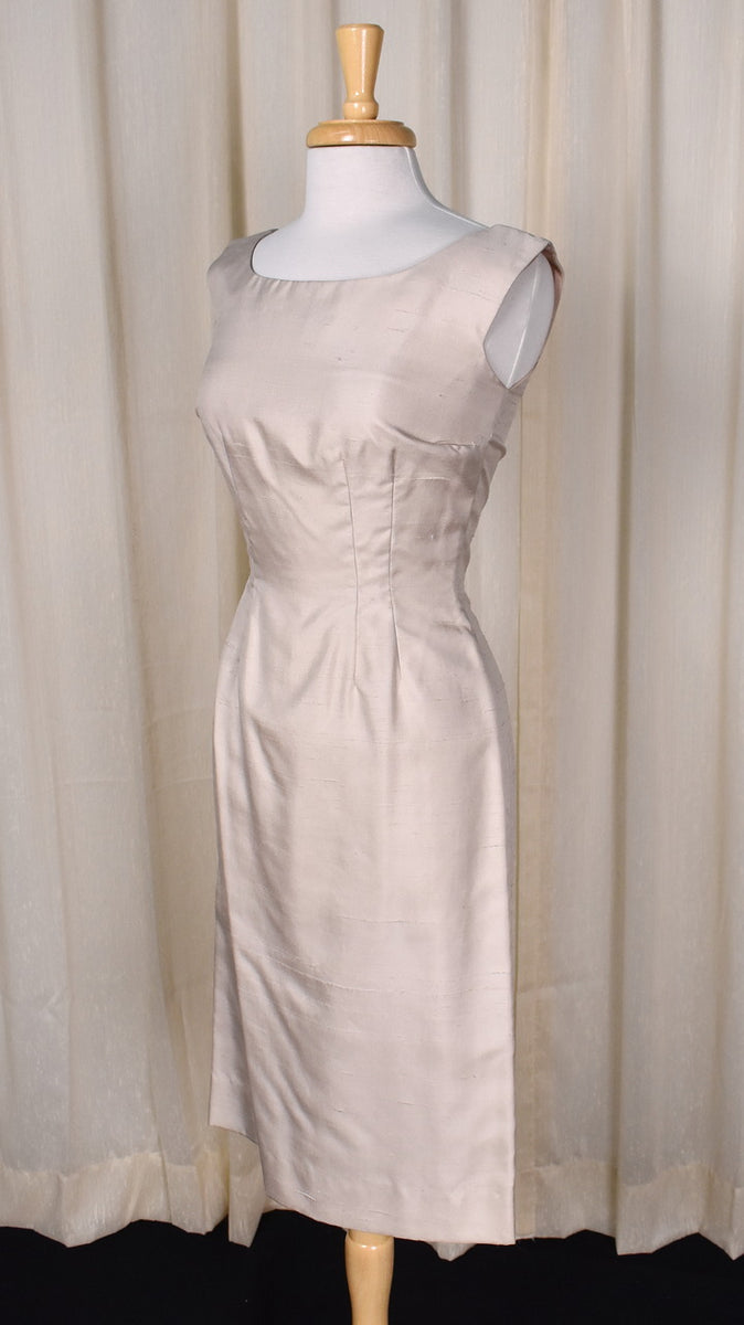 cream sheath dress Arcelia | Asymmetric-Neck Midi With Knot-Sleeve Detail clean silhouette Minimalist Cream Sheath Dress with