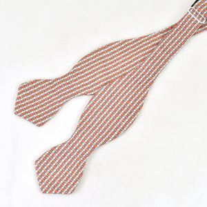 1950s Abstract Orange Bow Tie Cats Like Us