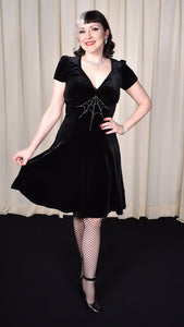 black morticia dress Velvet Venus Frilly Maxi | Theres no need for elaborate accessories when the dress itself already carries so much presence Morticia Black Velvet Dress